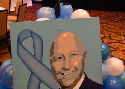 A painting of a man with a blue ribbon.