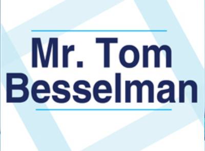 Mr tom besselman logo with a blue color.